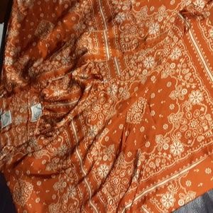 2 piece silky kimono and short top. its NWT. in pic 4 it has a rip on seam.